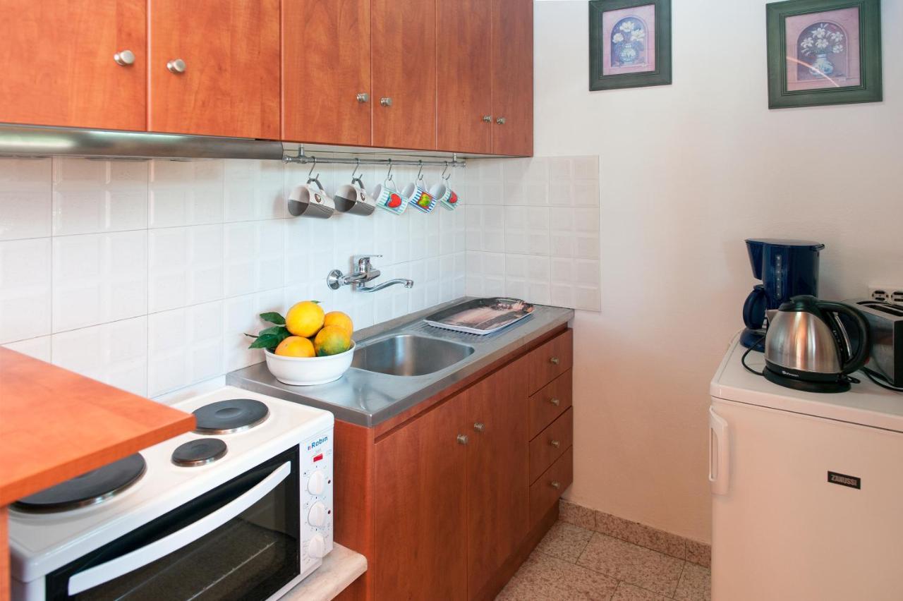 Amalia Cottages อากิออส กอร์ดิออส ภายนอก รูปภาพ